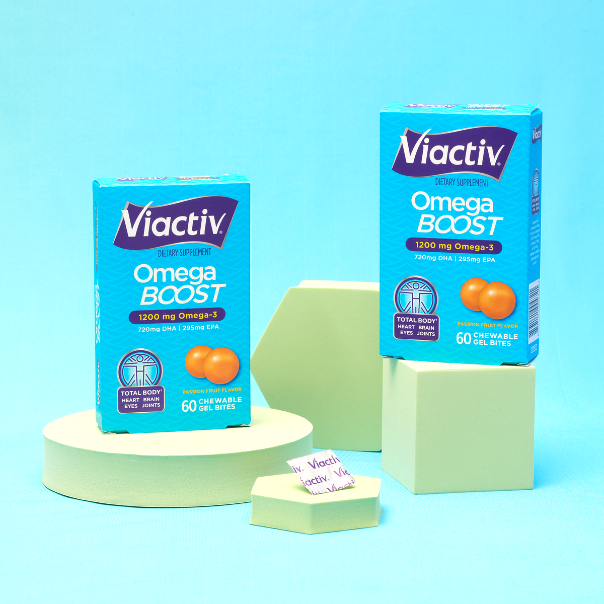 2 boxes of Viactiv Omega Boost with one pod in the center