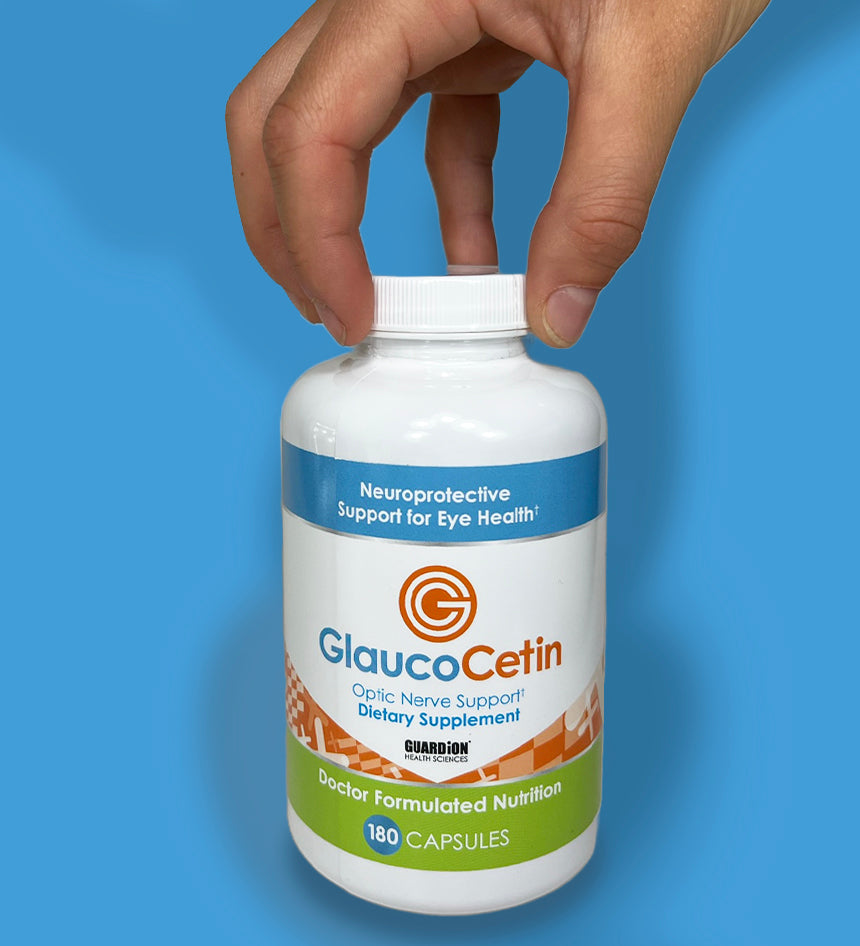 Hand holding GlaucoCetin bottle